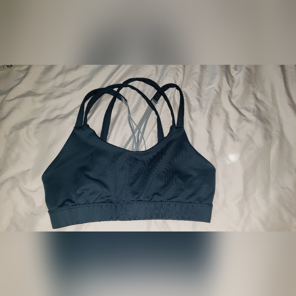 Champion Brand blue Sport top with designed crossed back cut out